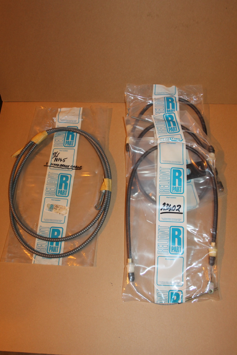 One handbrake and three clutch cables, 18145, 23402, NOS, Genuine Reliant Motors