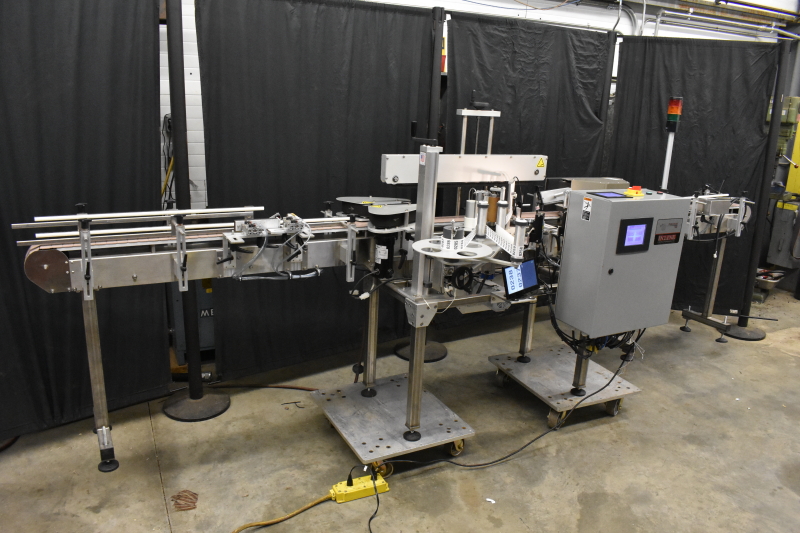 In-Line Paradigm 700 labeler with many options and vision system